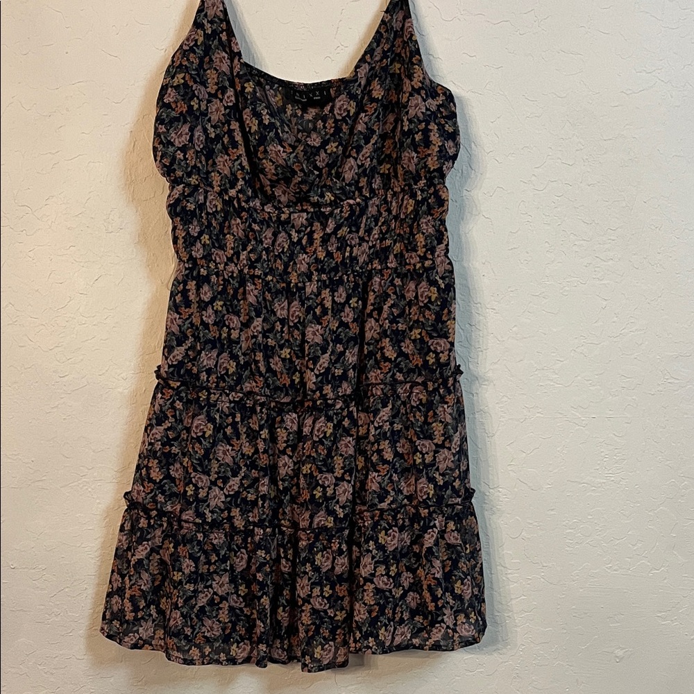 Floral spaghetti strap Mini Dress lined with ruffled tiers and gathered waist